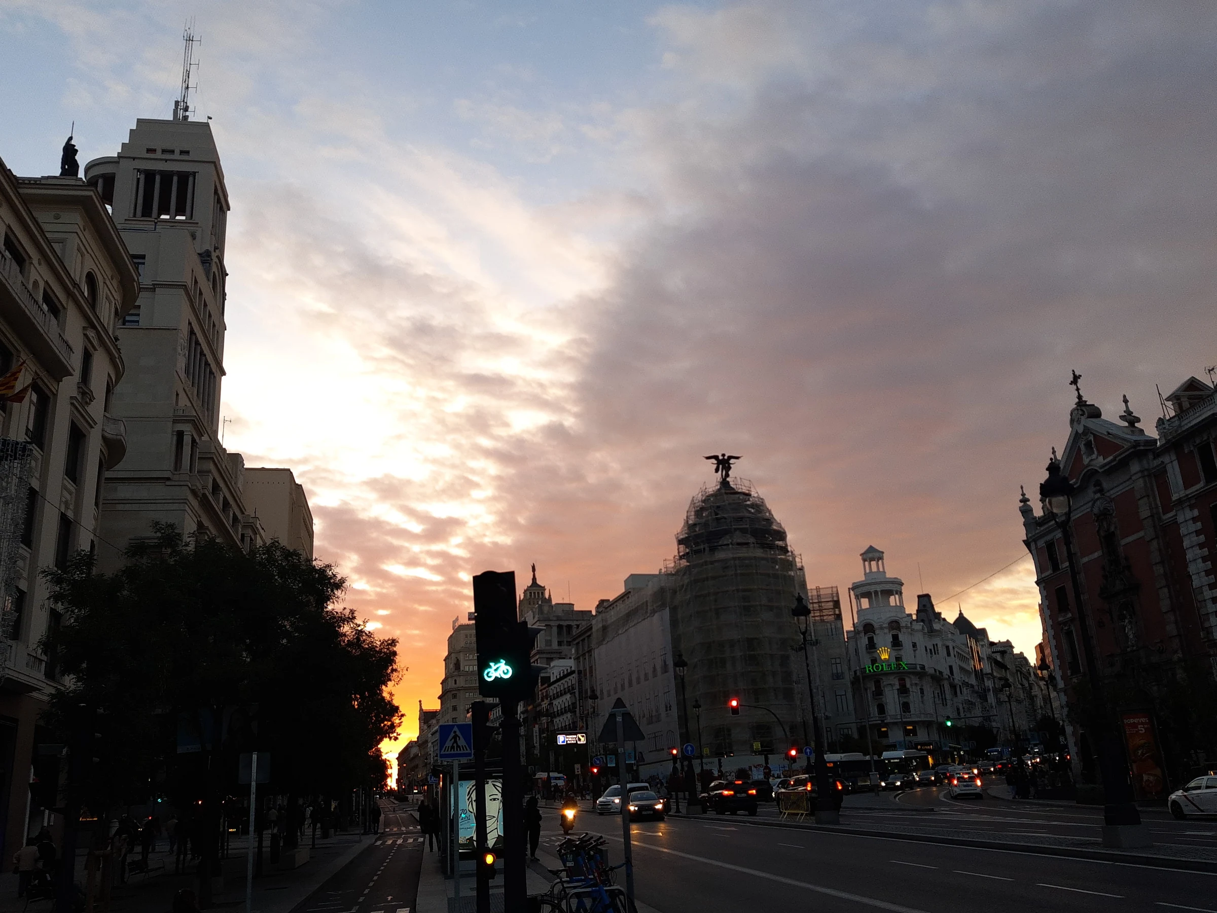 Sunset over Gran Vía in central Madrid, Spain